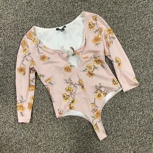 Pink floral bodysuit singlet
